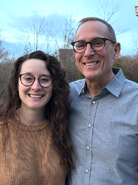 Katelyn and Phil standing next to each other.